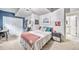 Comfortable bedroom featuring neutral walls, a comfortable bed, and closet for storage at 21502 E Idyllwilde Dr, Parker, CO 80138