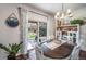 Cozy dining area with patio access and natural light, perfect for Gathering meals and entertaining at 21502 E Idyllwilde Dr, Parker, CO 80138