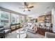 Bright, open-concept living space with hardwood flooring and great natural light at 21502 E Idyllwilde Dr, Parker, CO 80138
