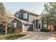 Charming two-story home featuring a well-manicured lawn and a welcoming entrance at 4128 S Riviera St, Aurora, CO 80018