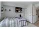 Bedroom featuring a large closet, ceiling fan, and comfortable carpeted floors at 1885 S Quebec Way # D22, Denver, CO 80231