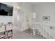 Upstairs hallway featuring carpeted floors, white doors, and a functional layout at 1885 S Quebec Way # D22, Denver, CO 80231