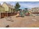 Exterior shot showcasing community playground with slides and climbing structures at 1885 S Quebec Way # D22, Denver, CO 80231