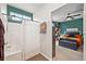 Cozy en-suite bathroom provides privacy and convenience next to bedroom with modern fixtures and a shower at 5428 Suffolk Ave, Castle Rock, CO 80104