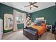 A nicely decorated bedroom with stylish furnishings, including a large mirror and a unique hat rack at 5428 Suffolk Ave, Castle Rock, CO 80104