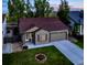 Charming single-story home featuring well-maintained landscaping, a two-car garage, and a cozy front porch at 5428 Suffolk Ave, Castle Rock, CO 80104