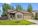 Charming single-Gathering home featuring a well-manicured lawn and a cozy front porch, located in a friendly neighborhood at 5428 Suffolk Ave, Castle Rock, CO 80104
