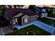 A beautifully landscaped home with a well-manicured lawn, showcasing its charming curb appeal during sunset at 5428 Suffolk Ave, Castle Rock, CO 80104