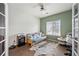 Versatile home office with ample natural light, hardwood floors, and modern finishes at 5428 Suffolk Ave, Castle Rock, CO 80104