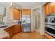 Spacious kitchen with stainless steel appliances, granite countertops and ample cabinet space for storage at 3064 Elk View Dr, Evergreen, CO 80439