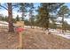 Scenic trail with a sign indicating 'Elk Summit', perfect for outdoor adventures with dogs on leashes at 3064 Elk View Dr, Evergreen, CO 80439