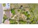 Vast property with potential, as shown by an aerial view of a house next to a plot of land at 229 Berthoud Way, Golden, CO 80401