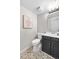 Updated bathroom features a modern vanity and tile floors at 229 Berthoud Way, Golden, CO 80401