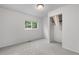 Bedroom featuring bright white walls and plush carpeting with window views and closet at 229 Berthoud Way, Golden, CO 80401