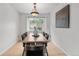 Cozy dining room with a modern light fixture and mountain views at 229 Berthoud Way, Golden, CO 80401