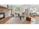 Living room features a brick fireplace and views of the backyard at 229 Berthoud Way, Golden, CO 80401