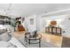 Finished basement with a cozy seating area, fireplace, and access to the upper level at 229 Berthoud Way, Golden, CO 80401
