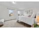Large main bedroom with two windows and neutral decor at 229 Berthoud Way, Golden, CO 80401