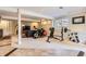 Basement gym with workout equipment, rec space and tv at 702 Windmill Pl, Highlands Ranch, CO 80126