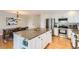 Kitchen with stainless steel appliances and views of the dining room at 702 Windmill Pl, Highlands Ranch, CO 80126