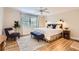 Serene main bedroom featuring a ceiling fan and natural light at 702 Windmill Pl, Highlands Ranch, CO 80126