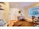 Bright home office with hardwood floors and natural light at 702 Windmill Pl, Highlands Ranch, CO 80126