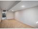 Wide angle shot of the finished basement, featuring recessed lighting and neutral walls at 8915 Field St # 113, Westminster, CO 80021