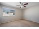 Cozy bedroom with natural light, a ceiling fan, and neutral carpeting at 8915 Field St # 113, Westminster, CO 80021