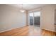 Sunny dining area featuring hardwood floors and sliding glass doors that lead to the patio at 8915 Field St # 113, Westminster, CO 80021