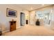 Upstairs bonus room with neutral carpet, recessed lighting, and access to the bathroom at 859 Equinox Dr, Erie, CO 80516