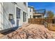 Fenced backyard with patio and views of the upper deck at 8050 Bryant St, Westminster, CO 80031