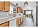 Functional kitchen with ample counter space, wood cabinets, and modern appliances at 8050 Bryant St, Westminster, CO 80031