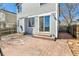 Back of home with patio, sliding glass doors, and brick walkways at 8050 Bryant St, Westminster, CO 80031