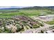 Scenic aerial view of the neighborhood, showcasing community layout and surrounding natural beauty at 10056 W Unser Dr # 106, Littleton, CO 80127