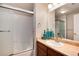 Clean bathroom features a shower-tub combo, vanity with sink, and contemporary fixtures at 10056 W Unser Dr # 106, Littleton, CO 80127