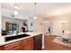 Open-concept kitchen boasts modern appliances, stylish countertops, and ample cabinet space at 10056 W Unser Dr # 106, Littleton, CO 80127