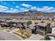 An aerial view showcasing the neighborhood and surrounding mountain views at 2363 S Lupine Way, Denver, CO 80228