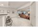 Spacious finished basement featuring a bar area, ample seating, and natural light at 2363 S Lupine Way, Denver, CO 80228