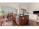 Kitchen with a central island and modern appliances at 2363 S Lupine Way, Denver, CO 80228