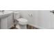 Modern bathroom features white sink and toilet at 6840 Merseyside Ln, Castle Pines, CO 80108