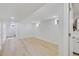 Finished basement featuring hardwood flooring and recessed lighting at 2701 Barnhart St, Thornton, CO 80229