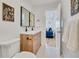 Stylish bathroom with a modern vanity, double sinks, and contemporary fixtures at 2701 Barnhart St, Thornton, CO 80229