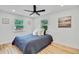 Cozy bedroom with natural light and hardwood floors, a perfect spot for rest and relaxation at 2701 Barnhart St, Thornton, CO 80229