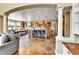 Open-concept space showcasing the kitchen and living room area, perfect for entertaining guests at 791 Elk Rest Rd, Evergreen, CO 80439