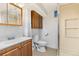 Clean basement bathroom with shower, toilet and vanity at 1338 Aspen Pl, Longmont, CO 80501