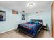 Basement bedroom with a double bed and neutral decor at 1338 Aspen Pl, Longmont, CO 80501