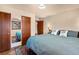 Main bedroom with wood floors and large closets at 1338 Aspen Pl, Longmont, CO 80501