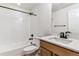 Bathroom featuring a shower-tub combo and a single sink vanity at 25041 E 38Th Ave, Aurora, CO 80019