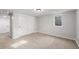 Comfortable carpeted bedroom with a large closet, neutral colored walls, and natural light creates an inviting atmosphere at 3999 W Chenango Ave, Littleton, CO 80123