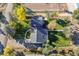 Aerial view of home showcasing mature trees, landscaping and outdoor living spaces at 12901 2Nd St, Parker, CO 80134
